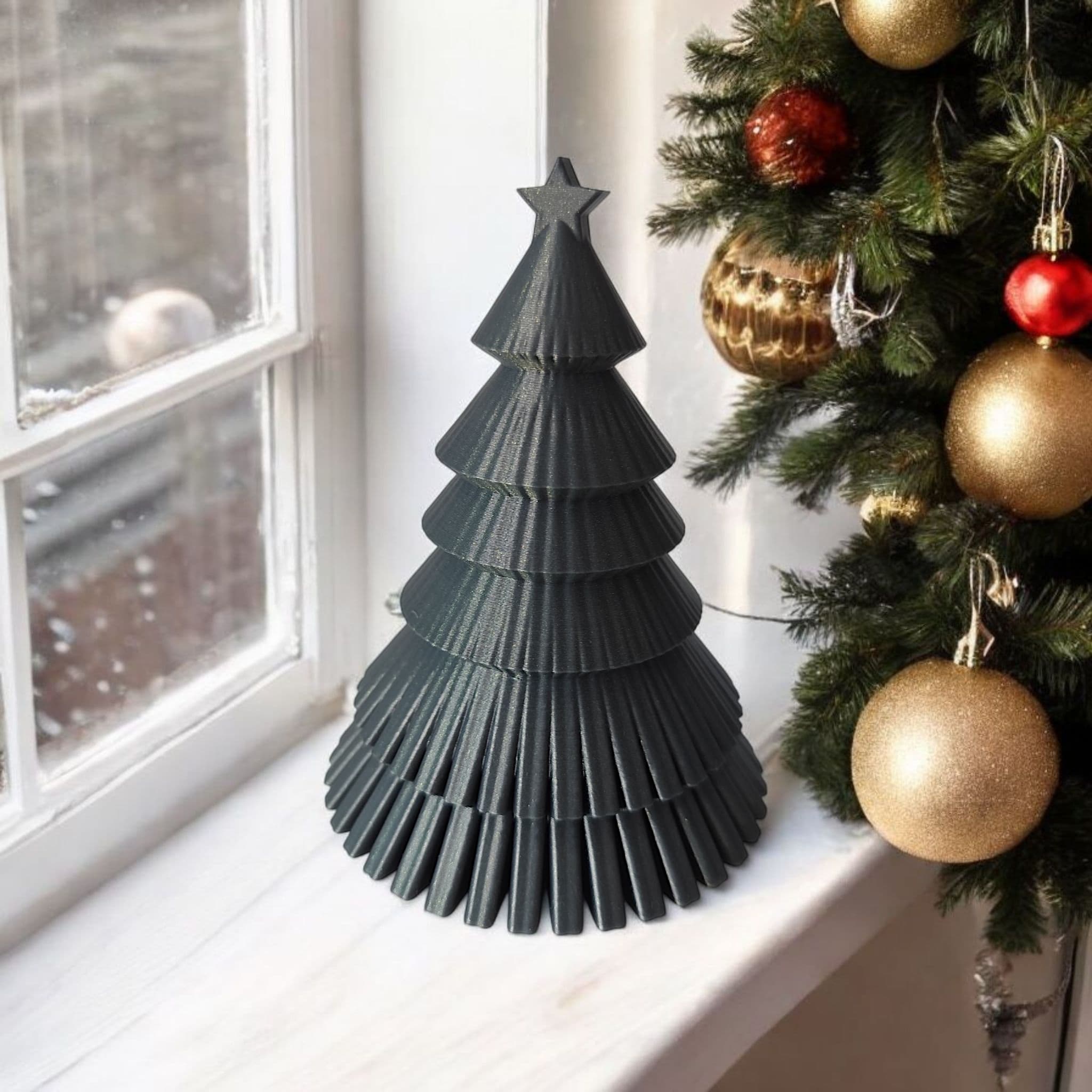 Moderno adorno navideño acanalado con estrella en la parte superior